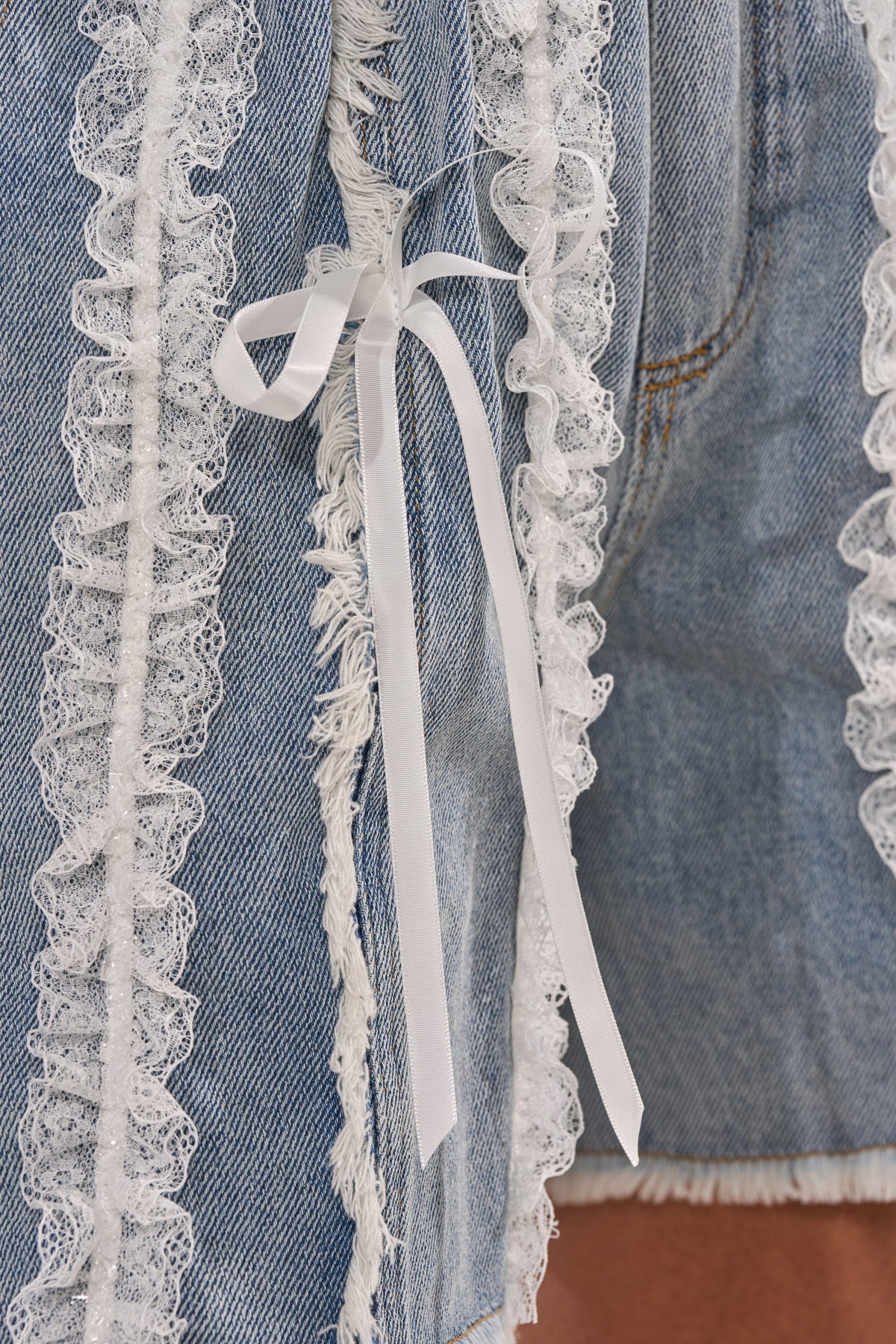 TIED AND LACED DENIM SHORTS