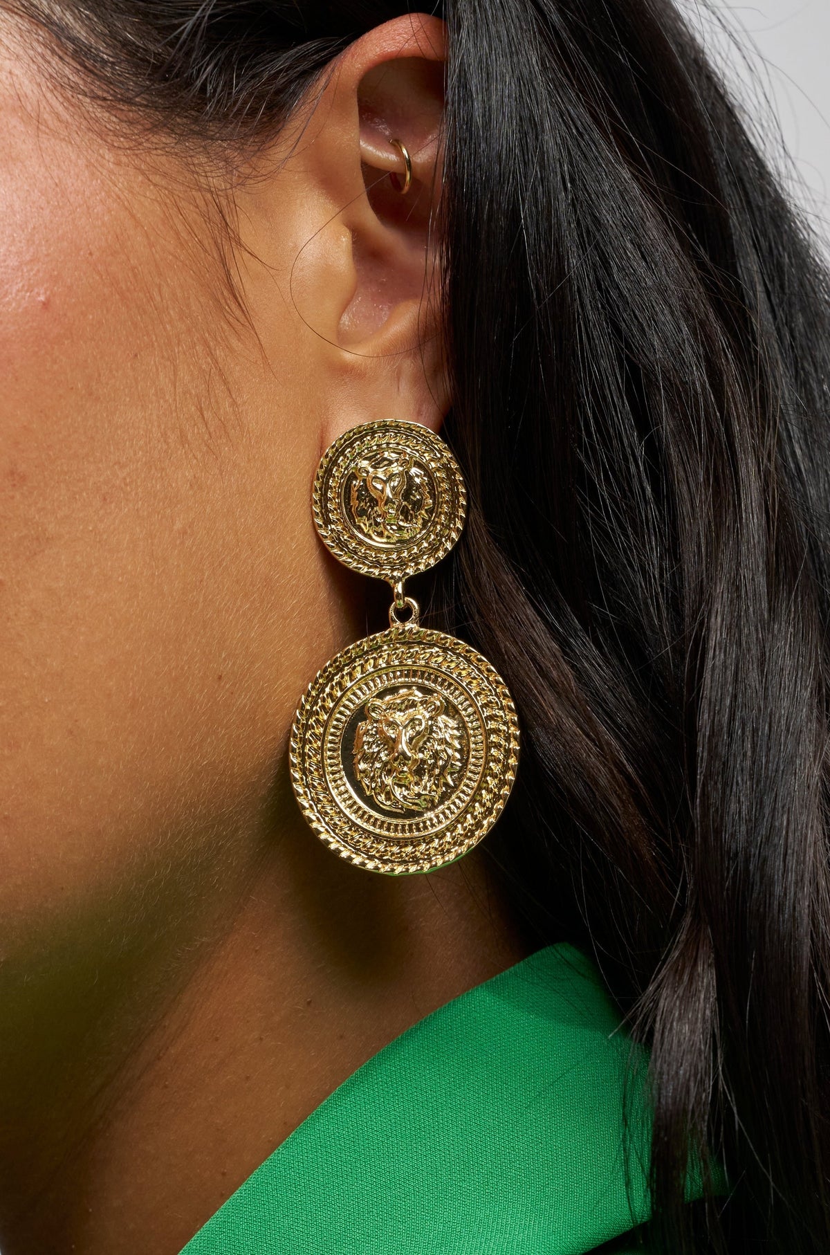 ABOUT THAT COIN EARRING