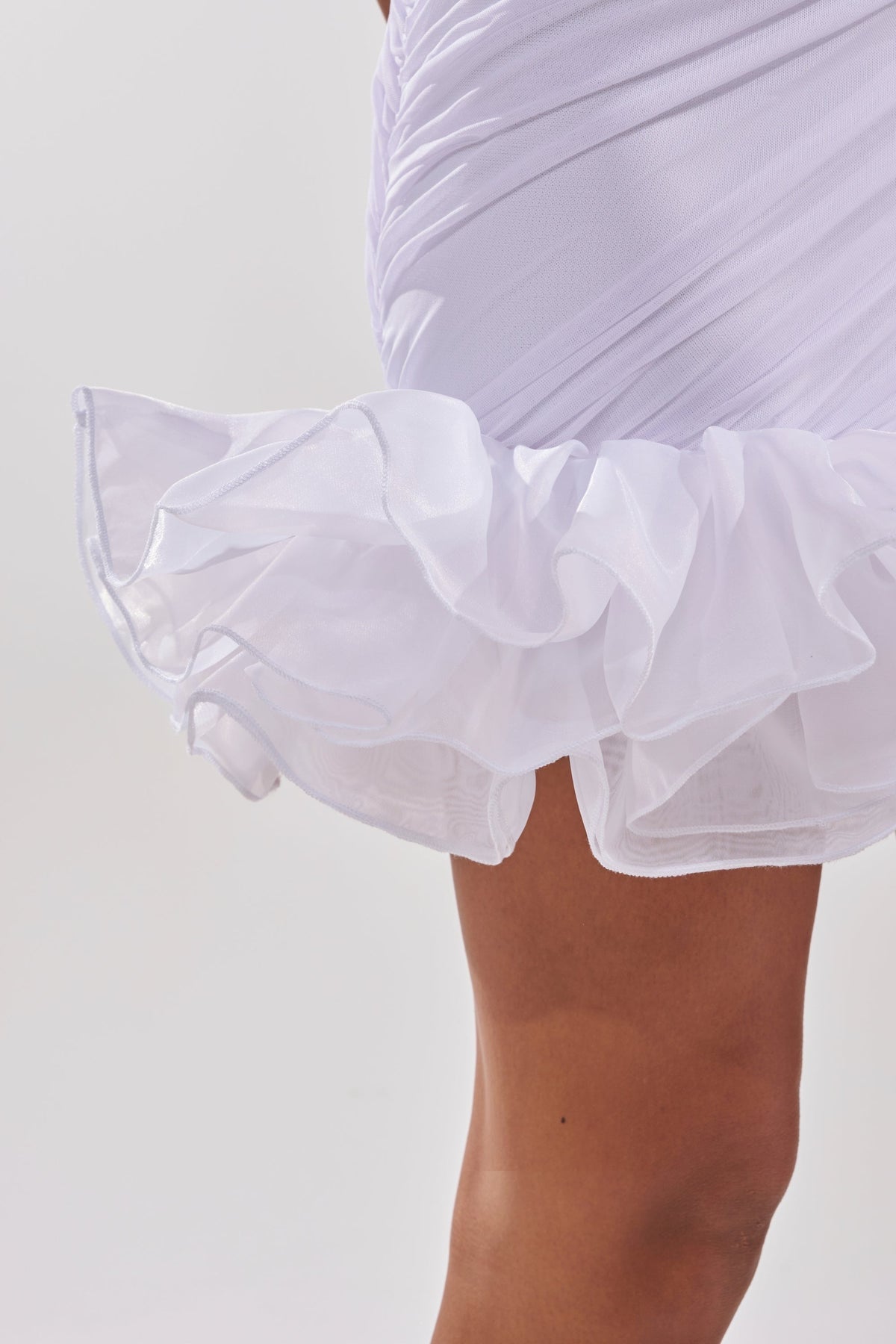 PRINCESS PEPLUM MINI DRESS IN WHITE