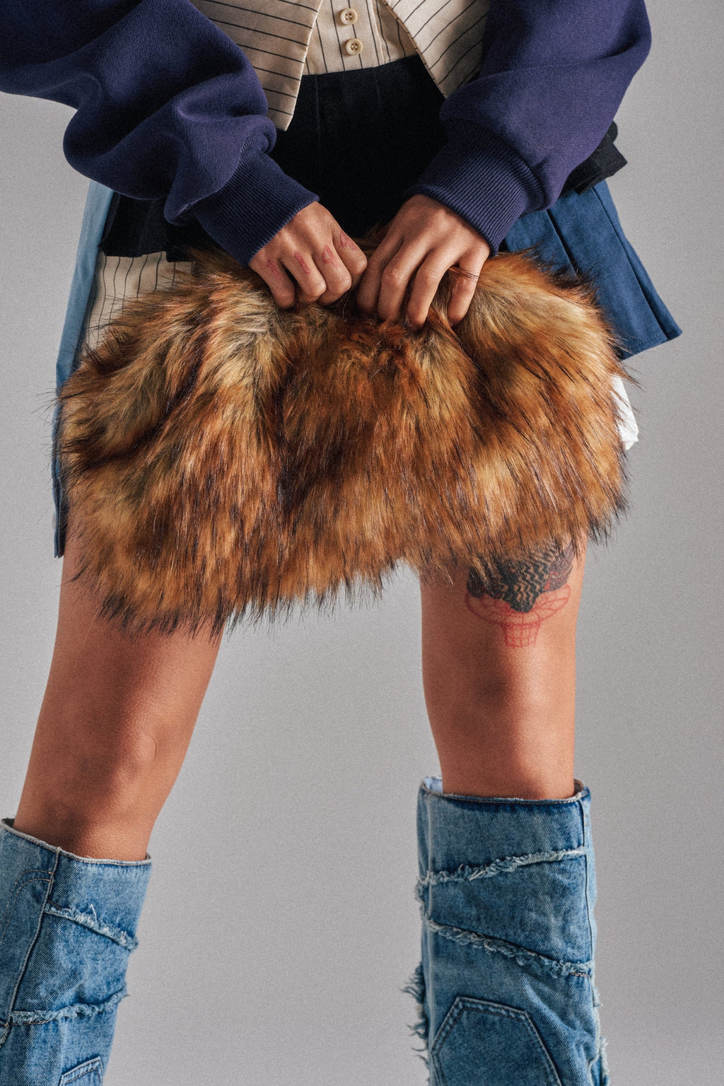 WILD CHILD FAUX FUR CLUTCH