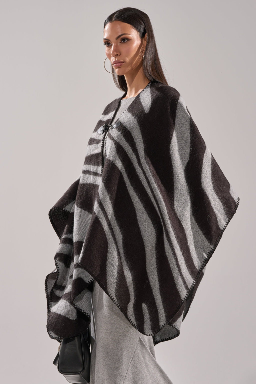 WILD CHILD KNIT PONCHO