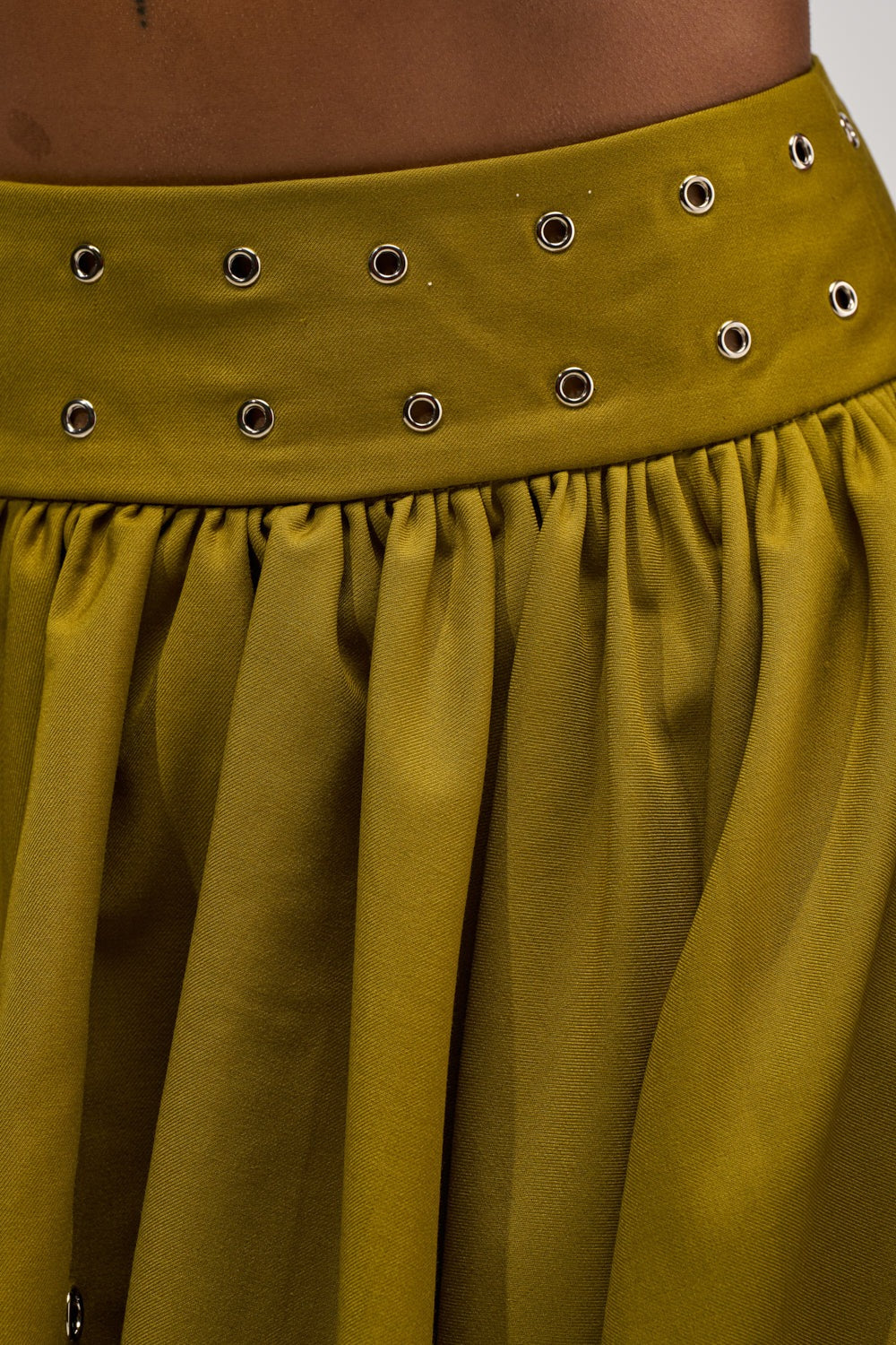 YOUNG AND FREE MINI SKIRT WITH GROMMETS