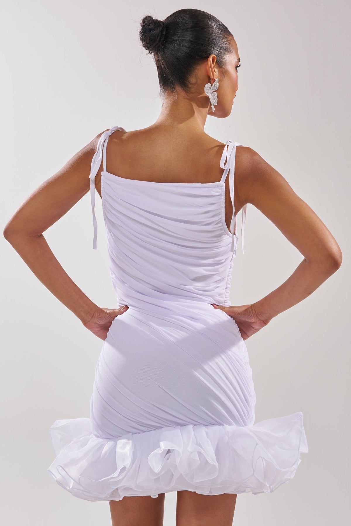 PRINCESS PEPLUM MINI DRESS IN WHITE