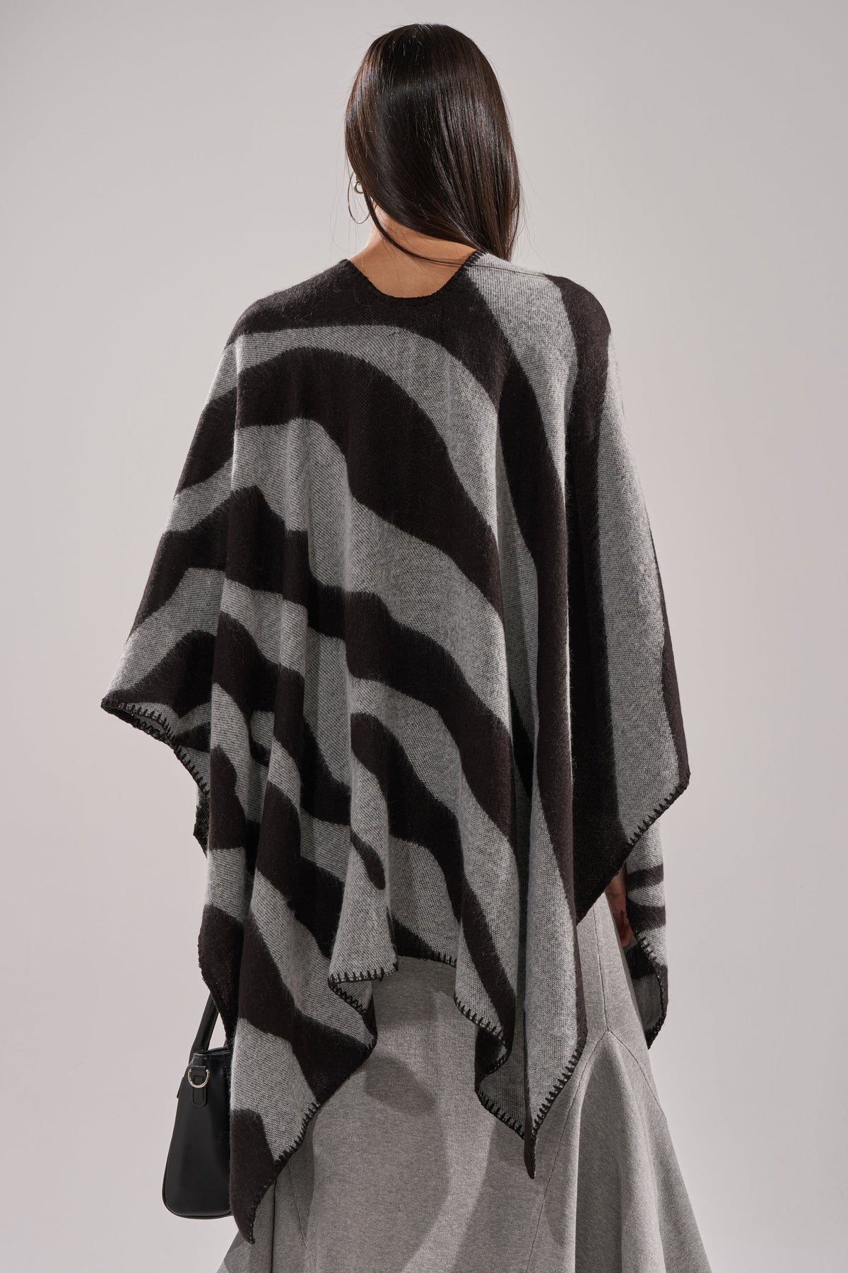 WILD CHILD KNIT PONCHO